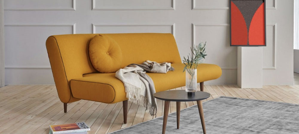 Modern room  with yellow modern looking Sofa 